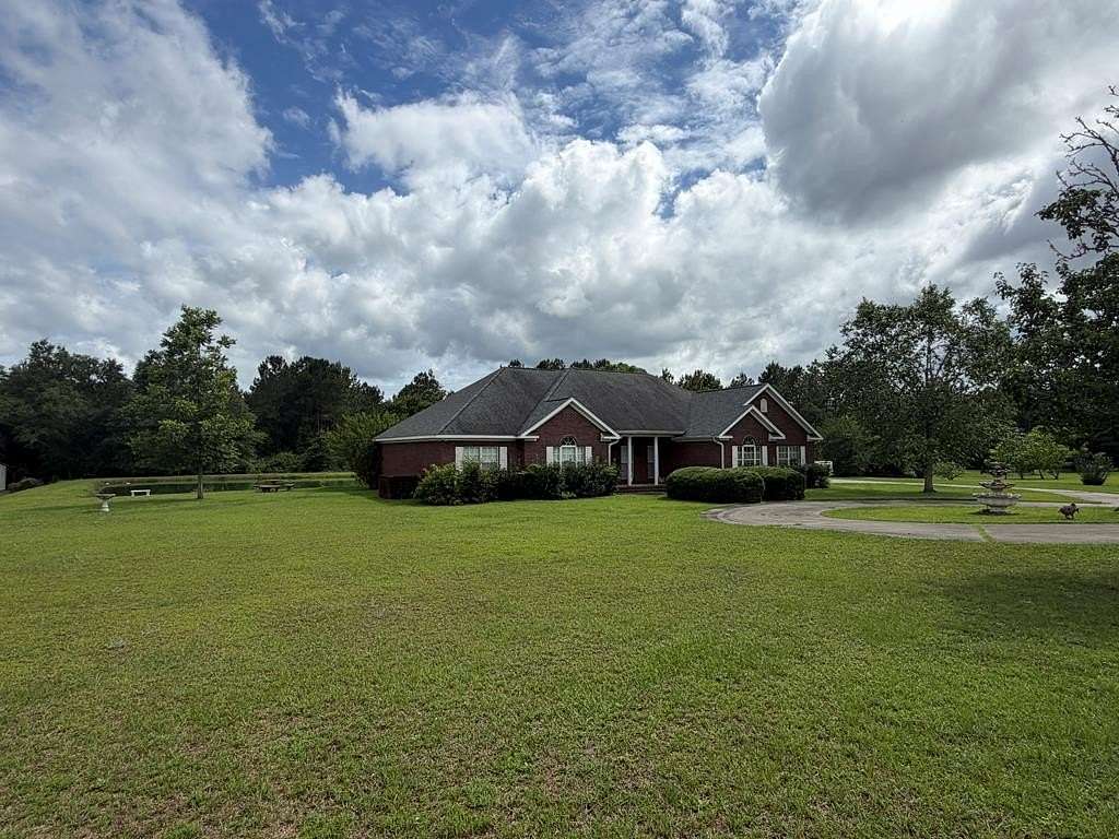 7.64 Acres of Land with Home for Sale in Hartford, Alabama