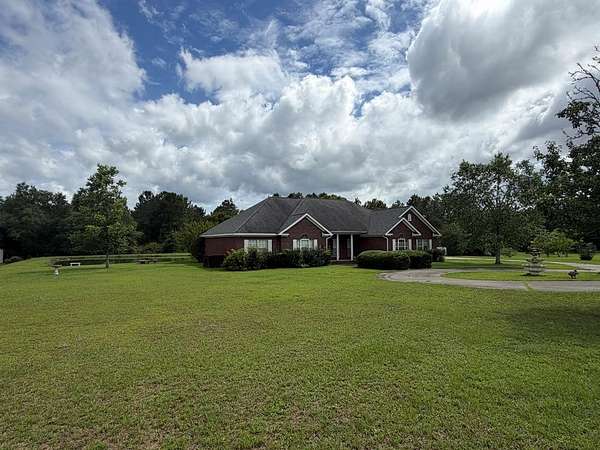 7.64 Acres of Land with Home for Sale in Hartford, Alabama