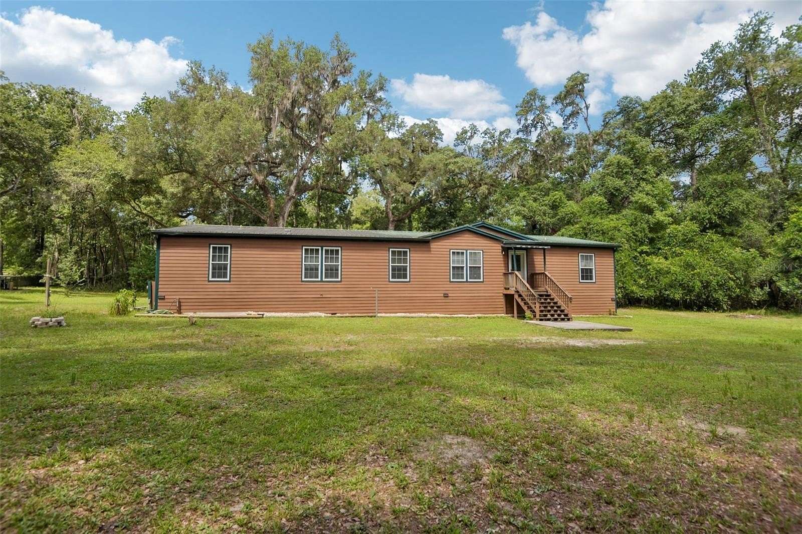 9.4 Acres of Land with Home for Sale in Brooksville, Florida