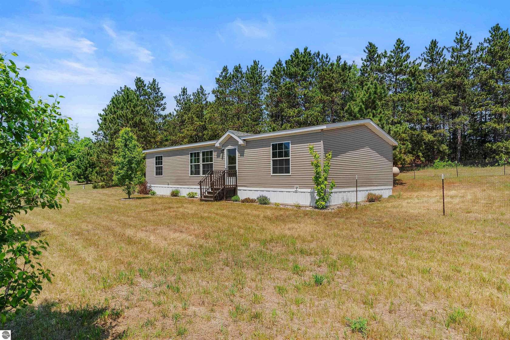 4 Acres of Land with Home for Sale in Interlochen, Michigan
