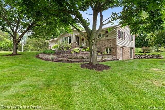 2.3 Acres of Land with Home for Sale in Green Oak Township, Michigan