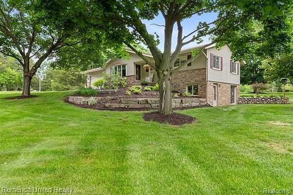 2.3 Acres of Land with Home for Sale in Green Oak Township, Michigan