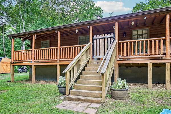 5.73 Acres of Land with Home for Sale in Chapmansboro, Tennessee
