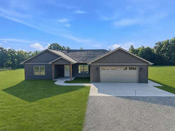 6.54 Acres of Land with Home for Sale in Auxvasse, Missouri