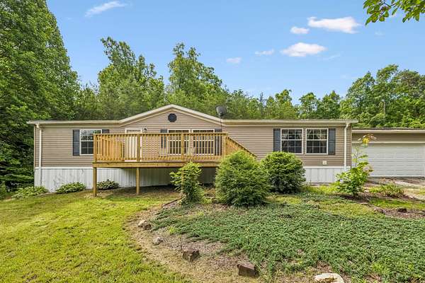 6.5 Acres of Land with Home for Sale in Tellico Plains, Tennessee