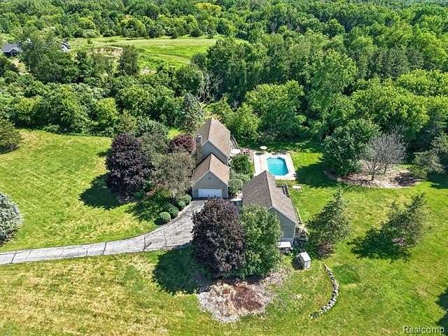 2.48 Acres of Land with Home for Sale in Hamburg Township, Michigan
