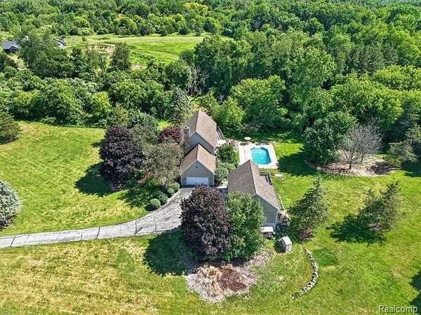 2.48 Acres of Land with Home for Sale in Hamburg Township, Michigan