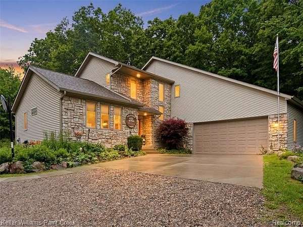 1.83 Acres of Land with Home for Sale in Addison Township, Michigan