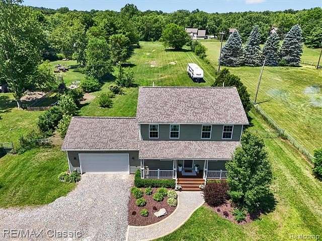 1.56 Acres of Land with Home for Sale in Highland Township, Michigan