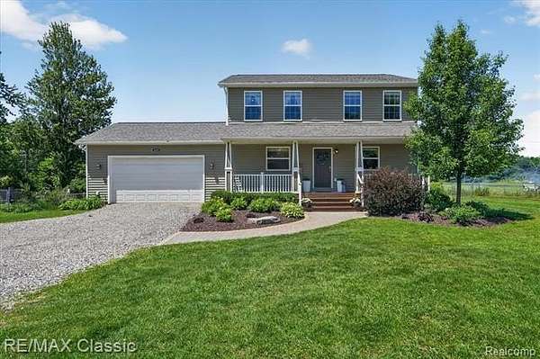 1.56 Acres of Land with Home for Sale in Highland Township, Michigan