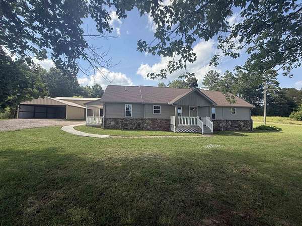 13.8 Acres of Land with Home for Sale in Enville, Tennessee