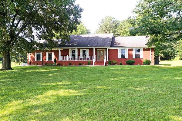 6.38 Acres of Land with Home for Sale in Mayfield, Kentucky