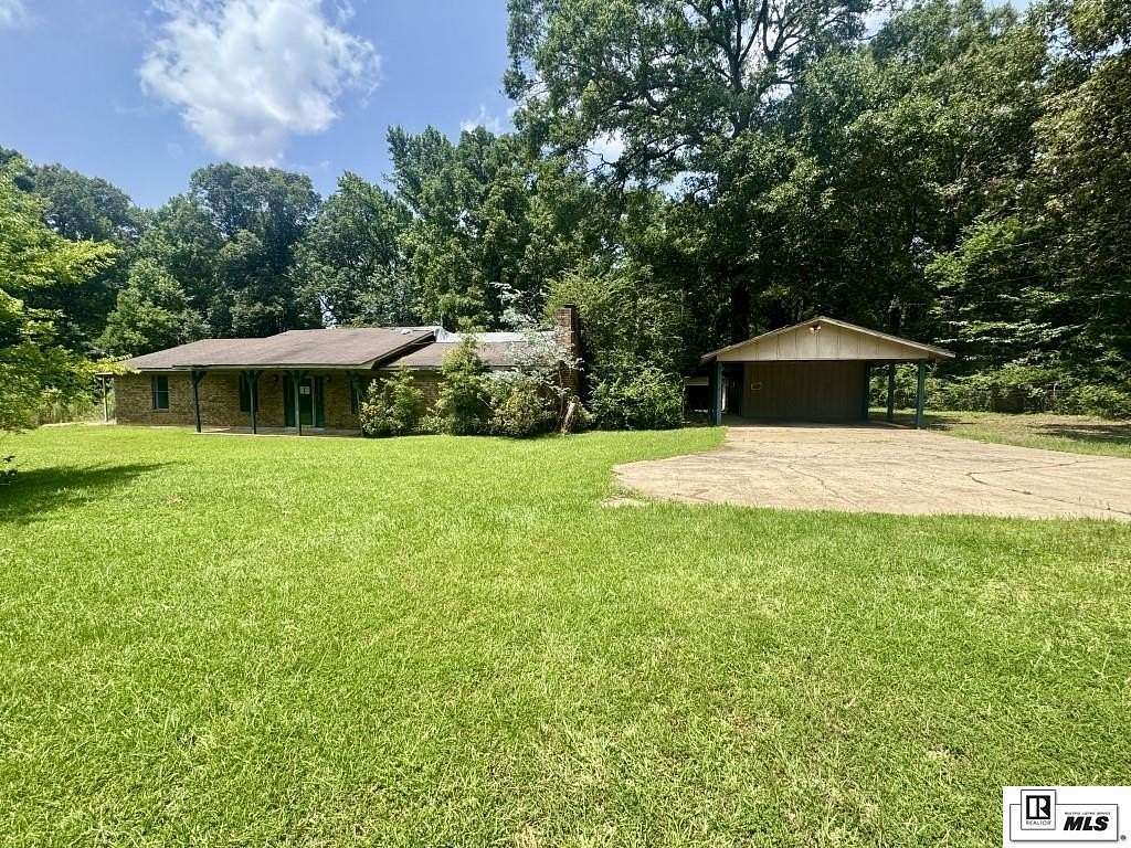 2.58 Acres of Land with Home for Sale in Bastrop, Louisiana