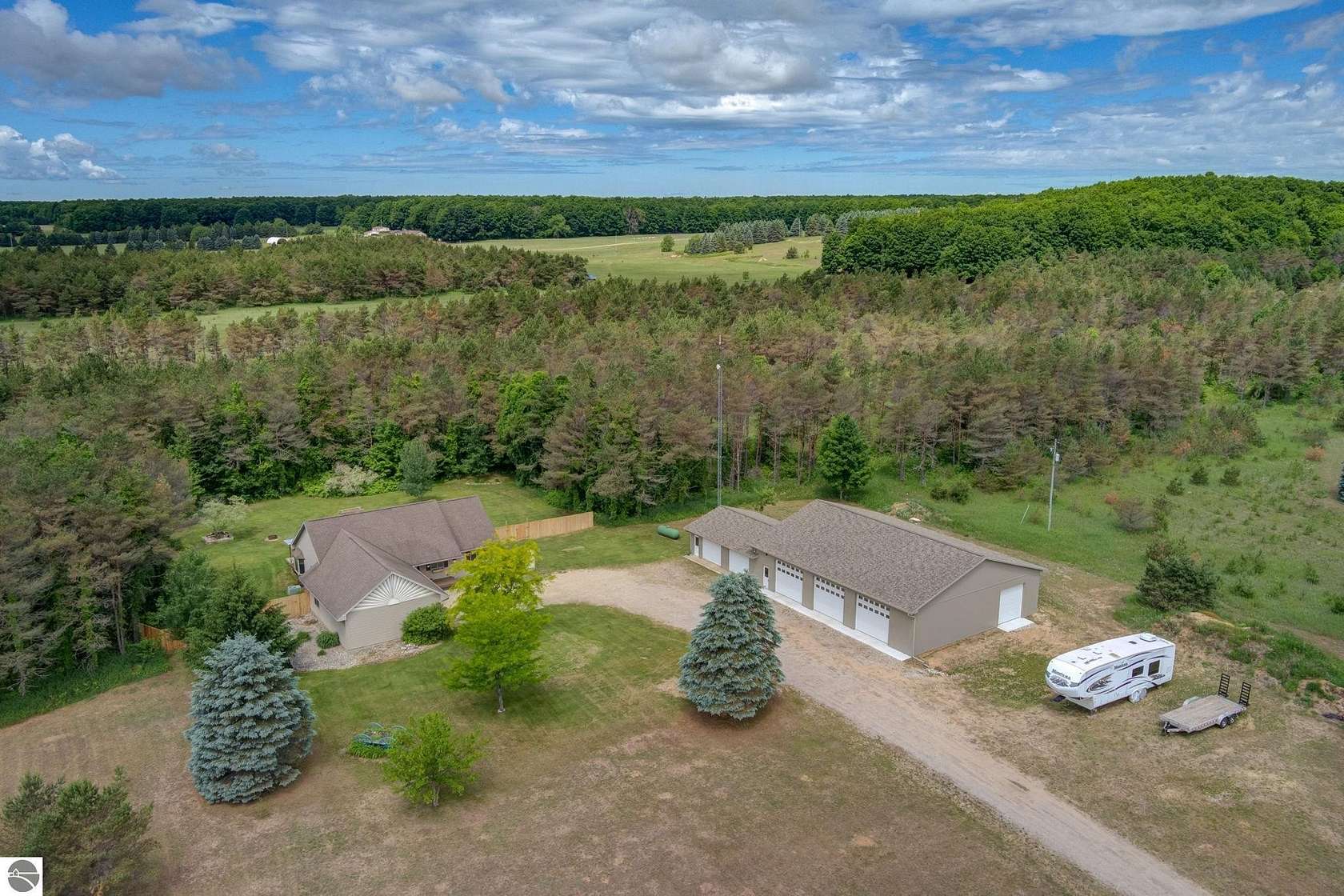 5 Acres of Land with Home for Sale in Rapid City, Michigan
