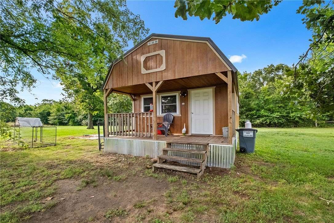 6.89 Acres of Land with Home for Sale in Prairie Grove, Arkansas