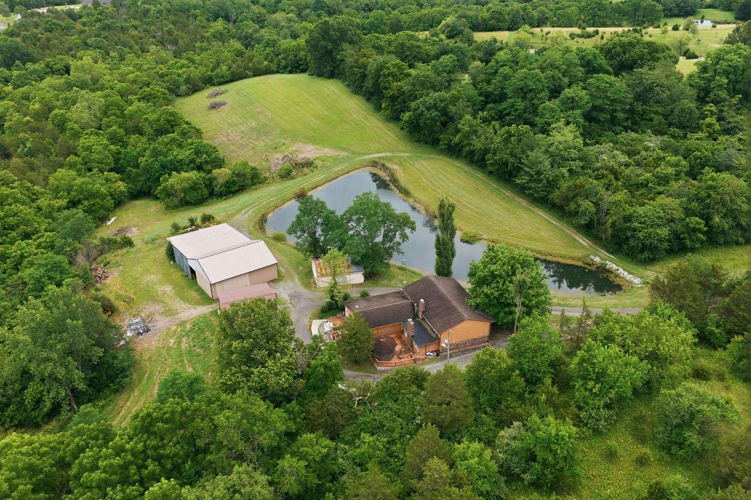 51.5 Acres of Recreational Land with Home for Sale in Aurora, Indiana
