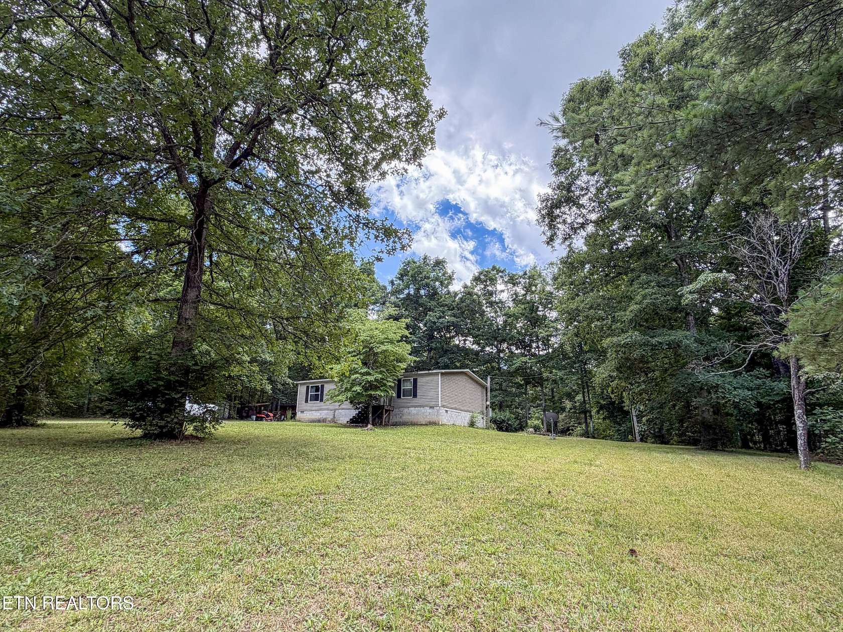 1.56 Acres of Land with Home for Sale in Crossville, Tennessee