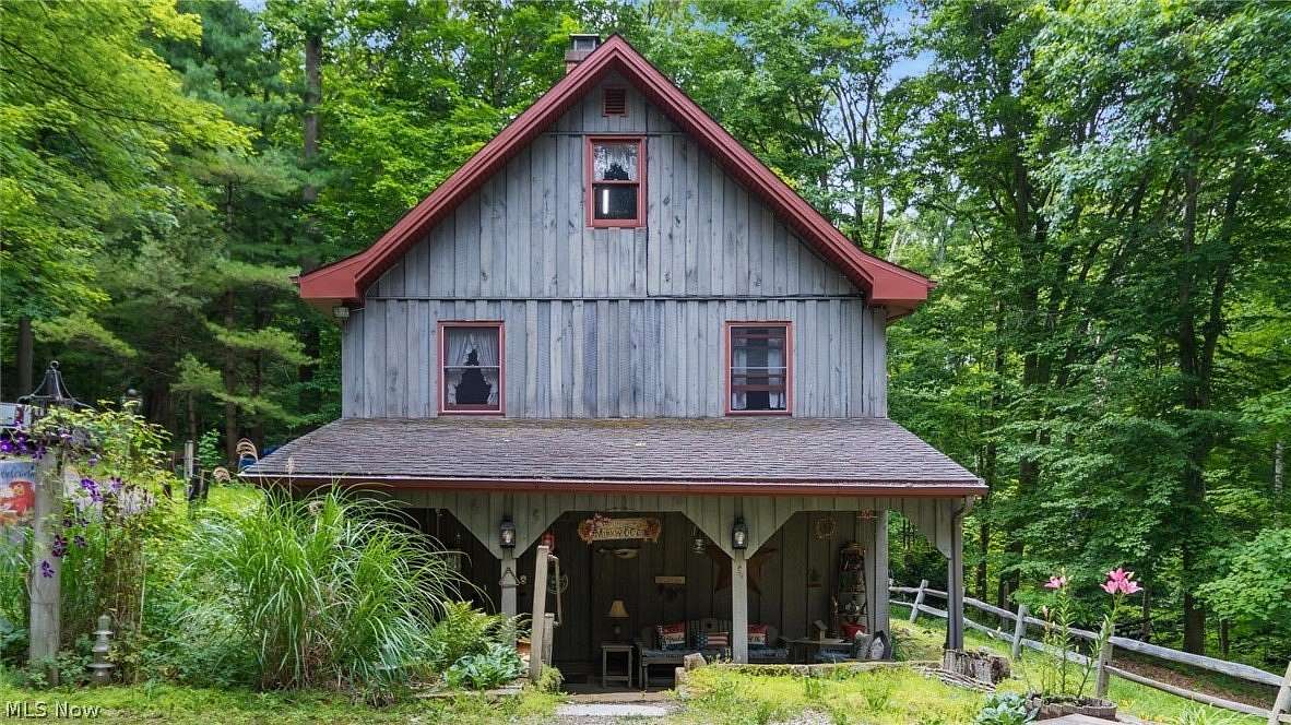 5.59 Acres of Land with Home for Sale in Kimbolton, Ohio