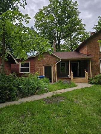1.8 Acres of Land with Home for Sale in Olivet, Michigan
