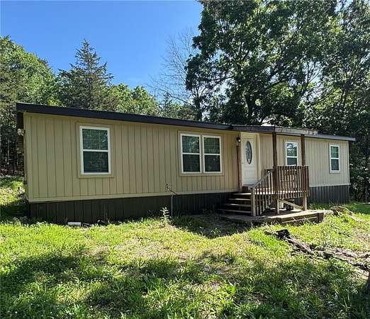 5 Acres of Land with Home for Sale in Berryville, Arkansas