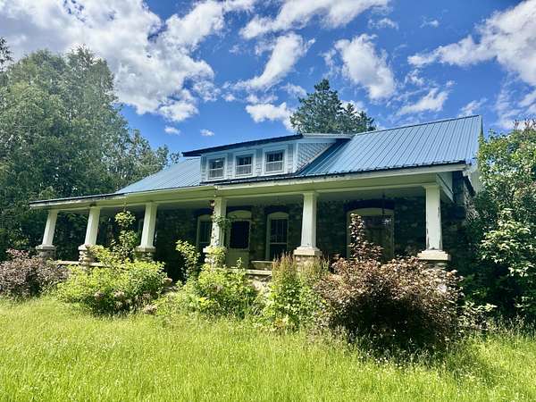 6 Acres of Land with Home for Sale in Barton City, Michigan