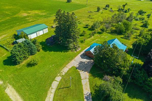6 Acres of Land with Home for Sale in Barton City, Michigan