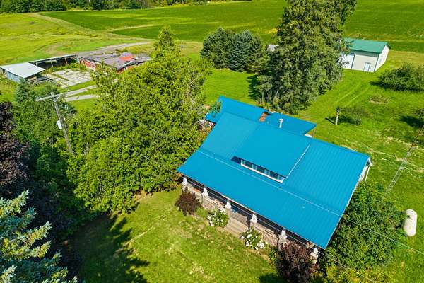 6 Acres of Land with Home for Sale in Barton City, Michigan