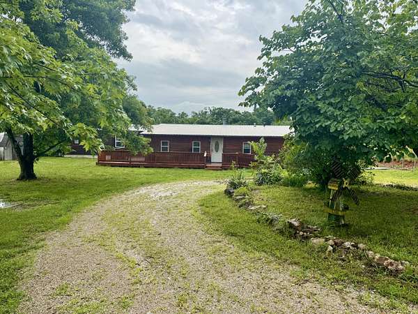 3.1 Acres of Land with Home for Sale in Hartville, Missouri