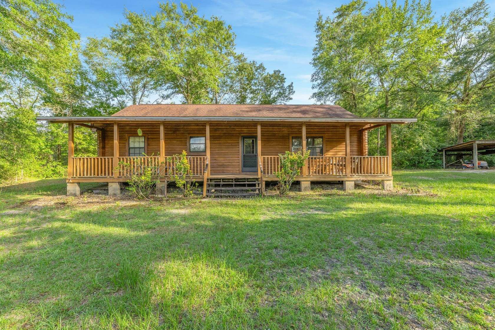 21.8 Acres of Recreational Land with Home for Sale in Quincy, Florida