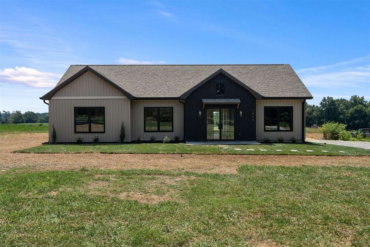 1.73 Acres of Land with Home for Sale in Scottsville, Kentucky