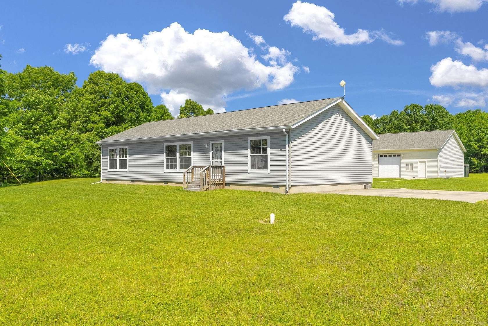 10 Acres of Recreational Land with Home for Sale in Lexington, Michigan