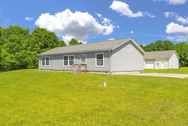 10 Acres of Recreational Land with Home for Sale in Lexington, Michigan