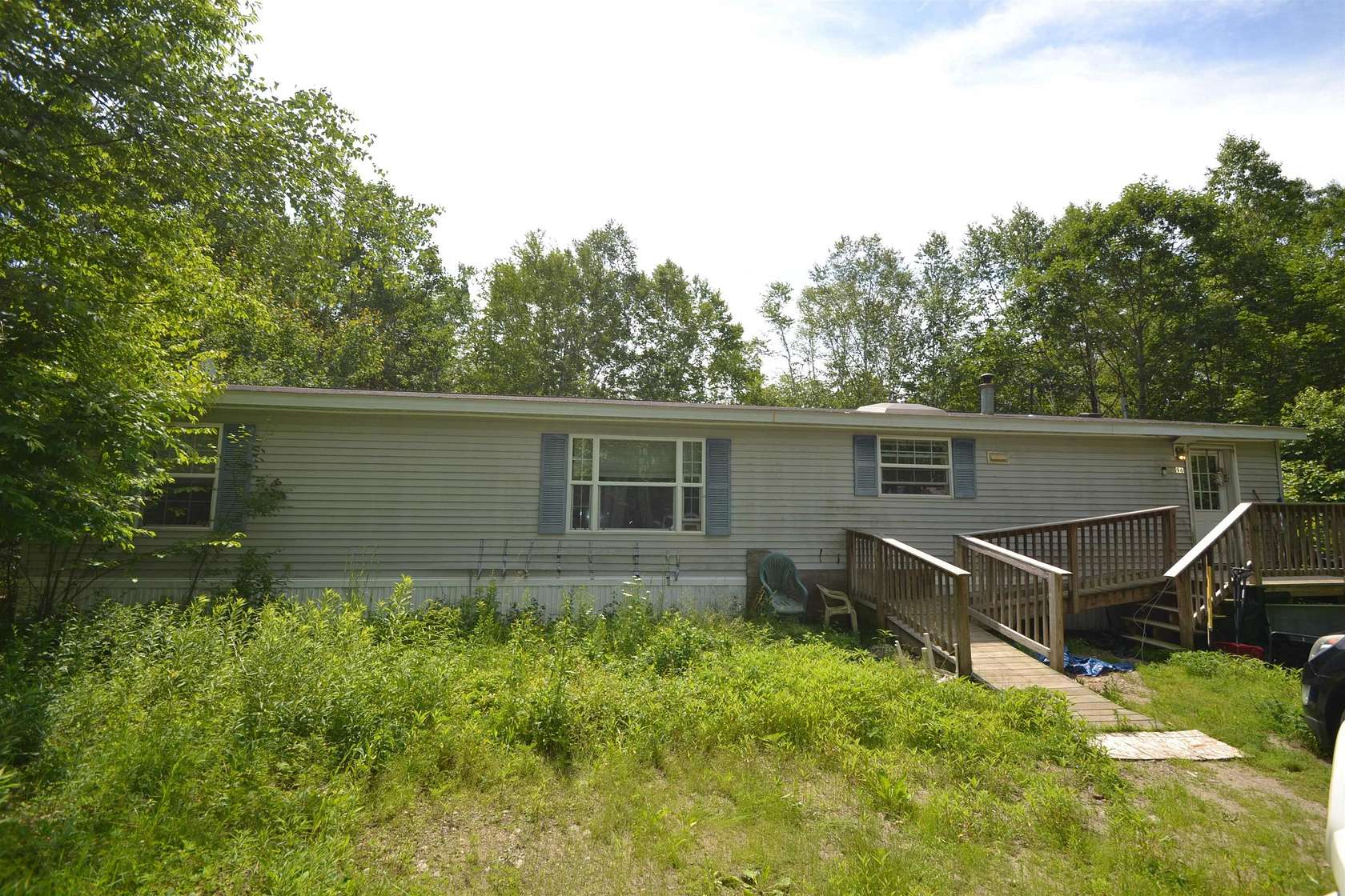 2.18 Acres of Land with Home for Sale in Holderness, New Hampshire