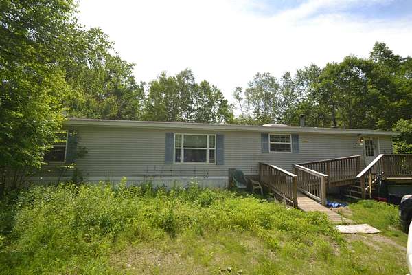 2.18 Acres of Land with Home for Sale in Holderness, New Hampshire