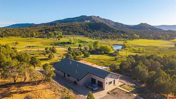 9.5 Acres of Land with Home for Sale in Mancos, Colorado