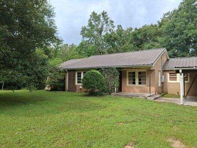 23.3 Acres of Recreational Land with Home for Sale in Timpson, Texas