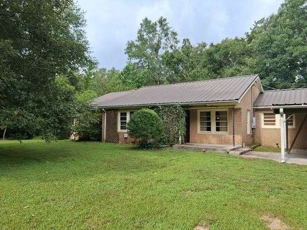 23.3 Acres of Recreational Land with Home for Sale in Timpson, Texas