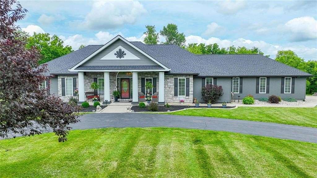 7 Acres of Land with Home for Sale in Peculiar, Missouri