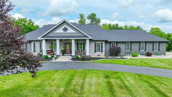 7 Acres of Land with Home for Sale in Peculiar, Missouri