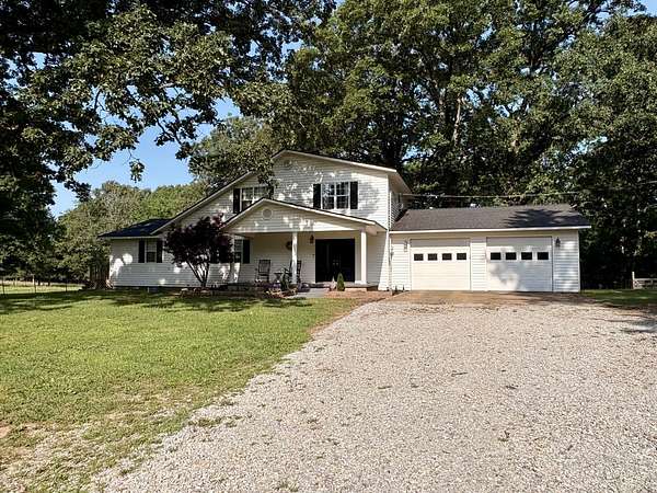 5 Acres of Land with Home for Sale in Ravenden, Arkansas