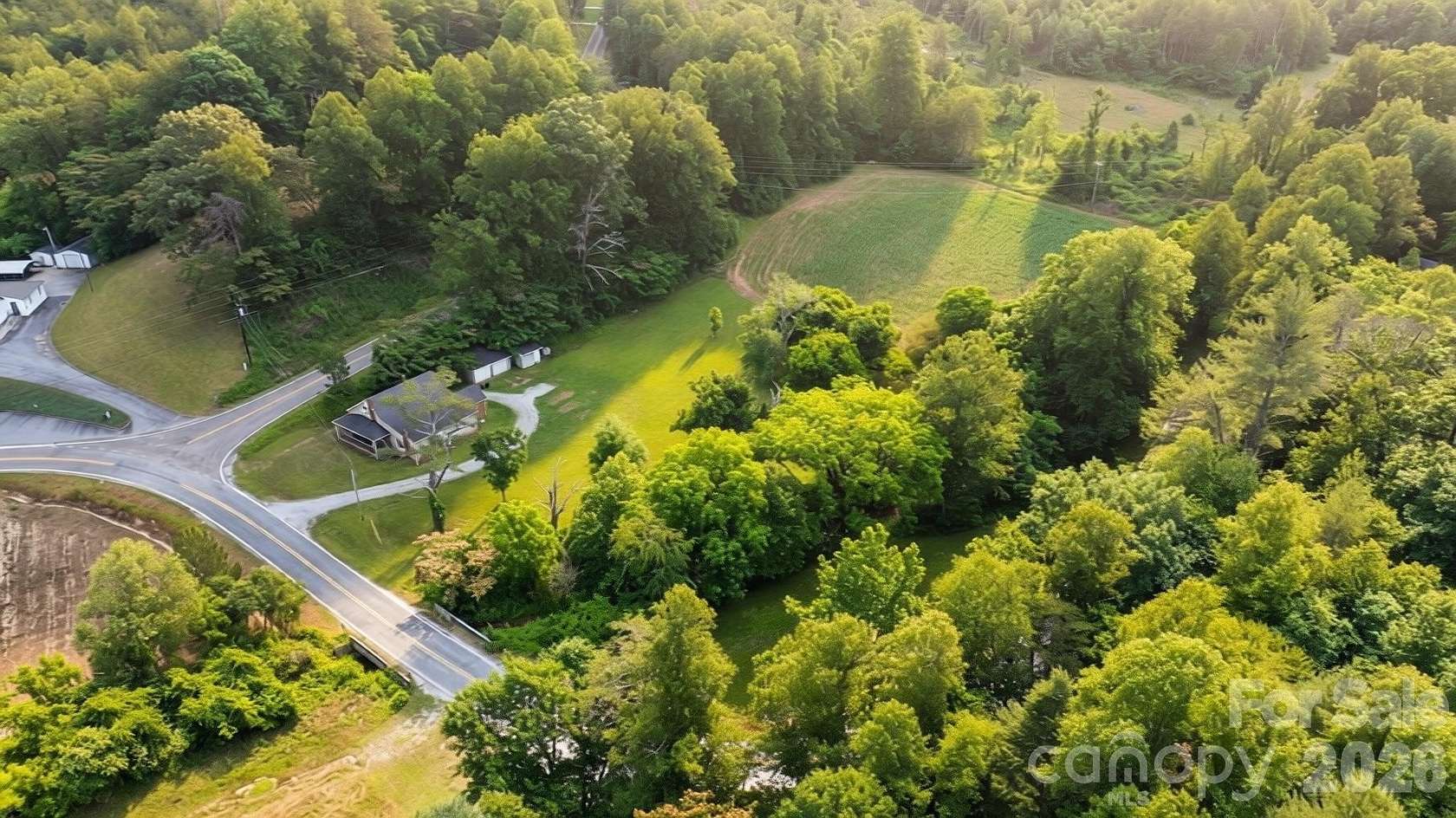 6.5 Acres of Land with Home for Sale in Lenoir, North Carolina