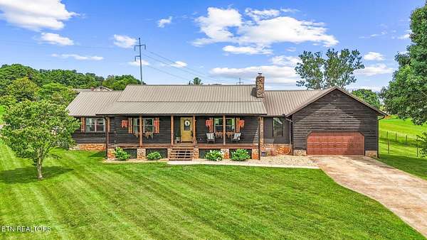 5.3 Acres of Land with Home for Sale in Greenback, Tennessee