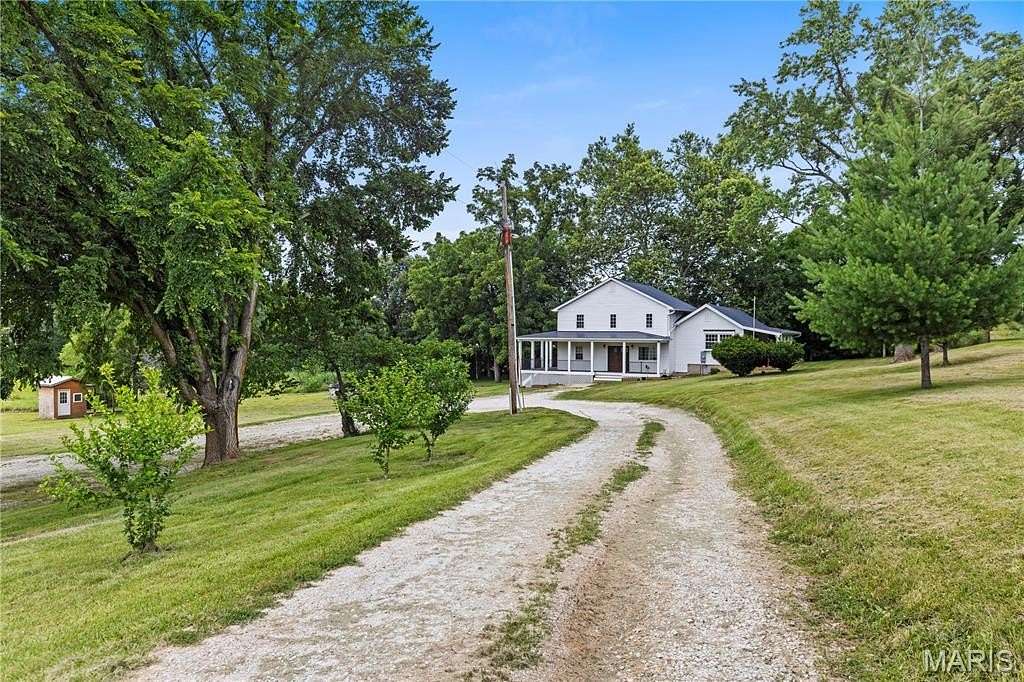 8.78 Acres of Land with Home for Sale in Foley, Missouri