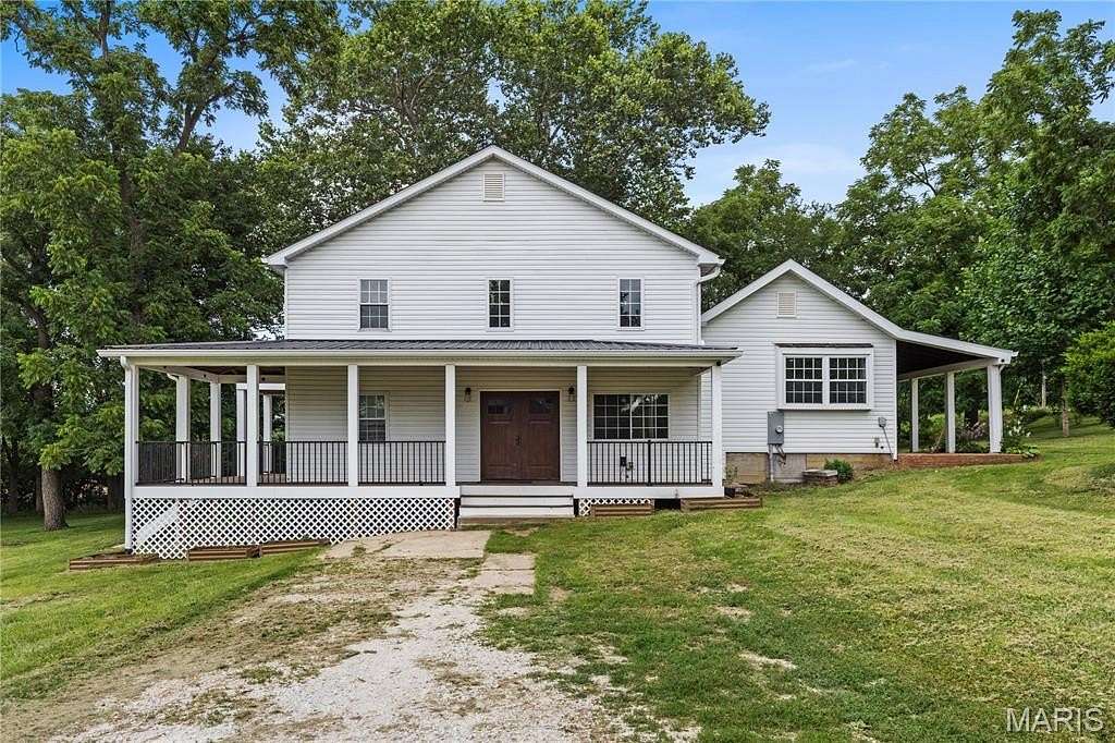 8.78 Acres of Land with Home for Sale in Foley, Missouri