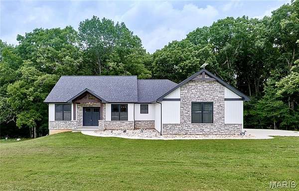 5.6 Acres of Land with Home for Sale in Troy, Missouri