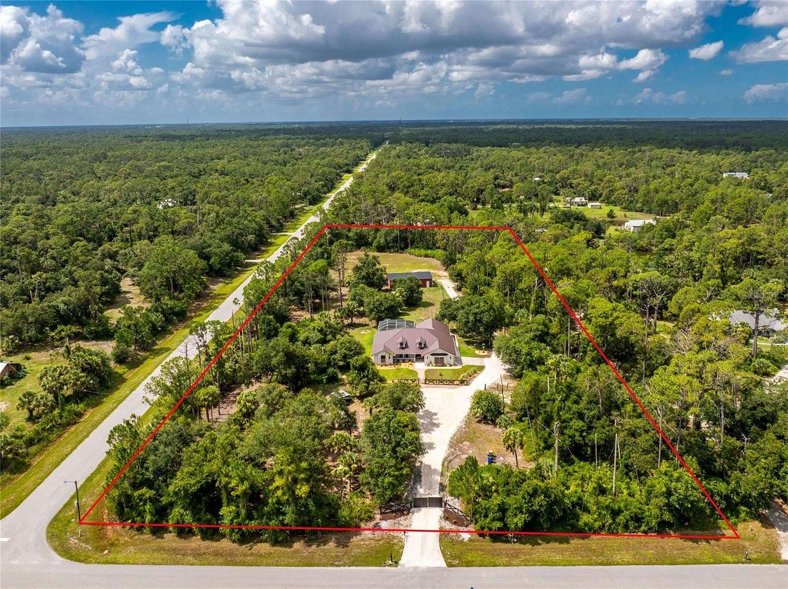 5.25 Acres of Land with Home for Sale in North Port, Florida