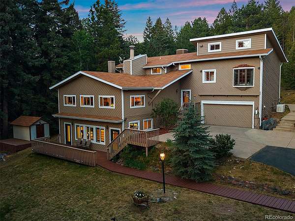 3.29 Acres of Land with Home for Sale in Evergreen, Colorado