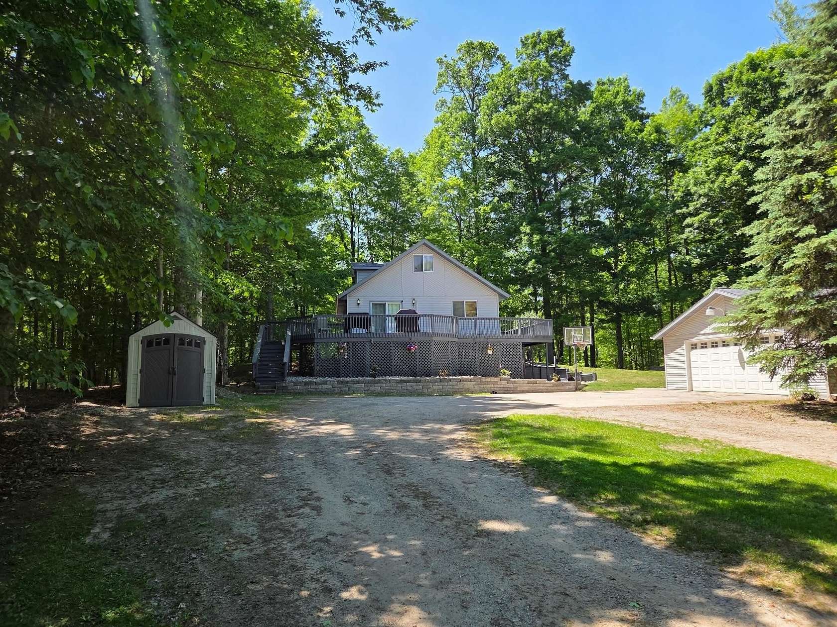 1.69 Acres of Land with Home for Sale in West Branch, Michigan