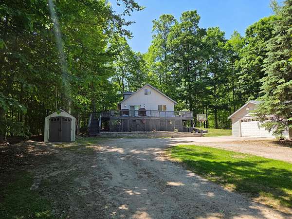1.69 Acres of Land with Home for Sale in West Branch, Michigan