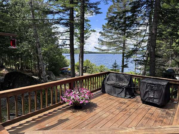 0.5 Acres of Land with Home for Sale in Rangeley, Maine